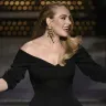 +Exclusively Adele